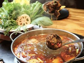 Hot Pot with Red Broth and Ladle of Braised Meat
